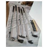5 Golf Clubs and 3 Extra grips