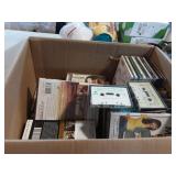 Large assortment of CDs DVDs and VHS Tapes