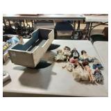 Vintage Doll Cradle full of Vintage dolls and