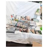 Large assortment of CDs DVDs and VHS Tapes