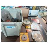 Tote of Saw Blades and Grinding and Cutoff Wheels.