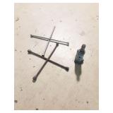 Bottle Jack and 2) 4-Way tools