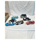 Lot of 7 1:36 Scale Police Cars