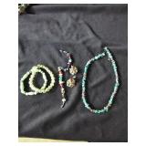 A pair of earrings, 2 bracelets and a necklace
