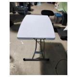 Adjustable  Folding Plastic Table.