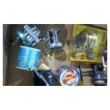 assorted fishing reels