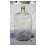 Large clear glass bottle