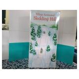 Village animated sledding hill