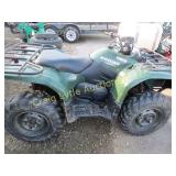 Kodiak Yamaha 4x4 quad with plow