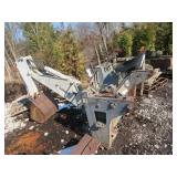 Bobcat 709 skid steer backhoe