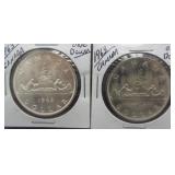 (2) 1963 Canadian Silver Dollars.