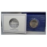 1986 Liberty UNC Half Dollar with Box & COA.