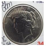 1925 Peace silver dollar.