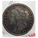 1885 Morgan silver dollar.