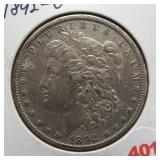 1892-O Morgan silver dollar.