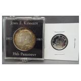 1964 Kennedy silver half dollar in holder and
