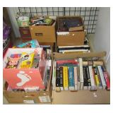 Large group of books, CDs, and VHS tapes