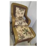 Outdoor wicker chair with matching footstool. Outdoor wicker chair with matching footstool.