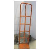 Two wheel dolly. Note: Bent and shows wear. Two wheel dolly. Note: Bent and shows wear.