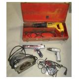 Various garage items including DeWalt sawzall,