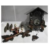 Vintage cuckoo clock depicting deer. Note: Shows