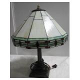 Like new stained glass style electric lamp. Like new stained glass style electric lamp.