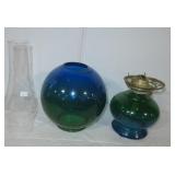 Hurricane style oil lamp. Measures 16" tall. Hurricane style oil lamp. Measures 16" tall.