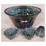 Blue carnival glass punch bowl set.