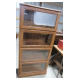 Four section lawyers cabinet. Measures 60.5" h x Four section lawyers cabinet. Measures 60.5" h x