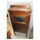 Vintage wood Victrola cabinet only. Measures 41" Vintage wood Victrola cabinet only. Measures 41"