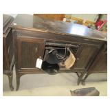 Antique Edison record player with cabinet.