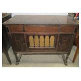 Antique Cheney record player with cabinet.