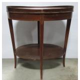Vintage two tier table. Measures 27" h x 24" w x Vintage two tier table. Measures 27" h x 24" w x