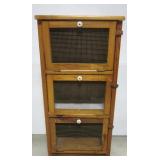 Three section pine cabinet. Measures 35" h x