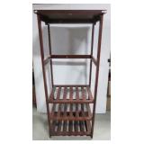 Wood shelving unit. Measures 60" h x 25" w x 20" Wood shelving unit. Measures 60" h x 25" w x 20"
