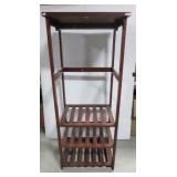 Wood shelving unit. Measures 60" h x 25" w x 20"