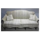 Upholstered Couch with throw pillows. Measures