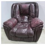 Leather rocking recliner. Note: shows some wear. Leather rocking recliner. Note: shows some wear.