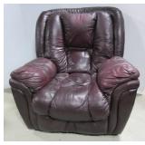 Leather rocking recliner. Note: shows some wear.