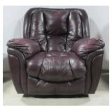 Leather rocking recliner. Note: shows some wear.