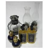 Various oil lamps & (6) 16 ounce lamp oil. Various oil lamps & (6) 16 ounce lamp oil.