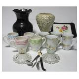 Glassware items including vases, coffee cups,