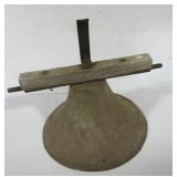 Cast iron dinner bell. Measures 18" across. Note: Cast iron dinner bell. Measures 18" across. Note: