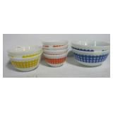 Set of 8 vintage Pyrex bowls of various sizes.