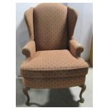 Upholstered occasional chair.