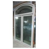 Like new three panel dual crank arched window. Like new three panel dual crank arched window.