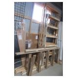 (4) Pieces of framed hideaway door tracks. (4) Pieces of framed hideaway door tracks.