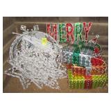 Large group of outdoor Christmas lighted items.