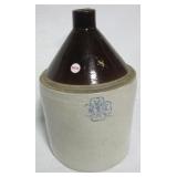 Two gallon salt glazed jug. Note: Has chips. Two gallon salt glazed jug. Note: Has chips.