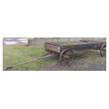 Antique steel wheel 10ft long by 4ft wide wagon. Antique steel wheel 10ft long by 4ft wide wagon.